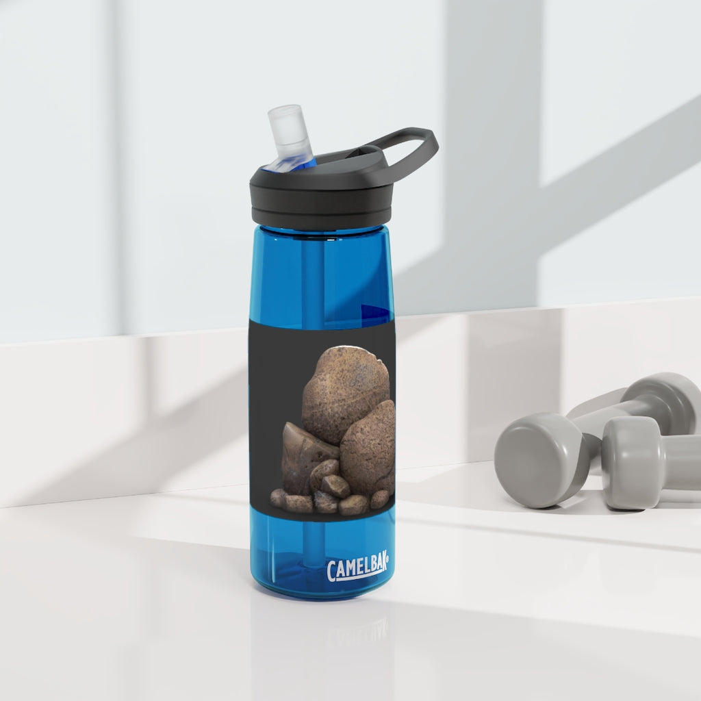 Rocks CamelBak Eddy® Water Bottle in 20oz and 25oz sizes, showcasing its durable Tritan™ material and spill-proof design.